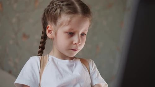 Girl Interacting with Digital Tablet Close Up