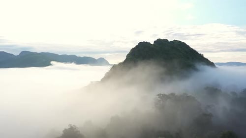 Aerial View Of Tropical Mountain And Rain Forest Landscape In The Morning Mist