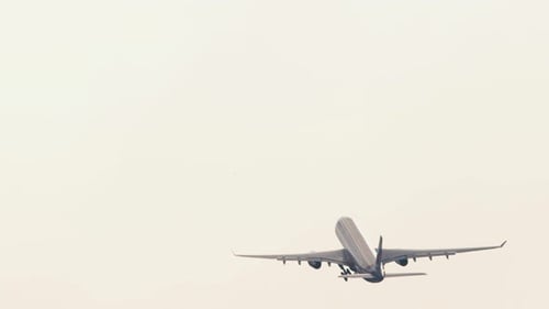 Airplane Departure Silhouette in the Sky