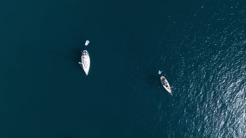 Aerial View of Yacht in Deep Blue Sea By the Gran Canaria Coastline