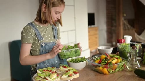 Girl Preparing Healthy Sandwiches in a Home Kitchen