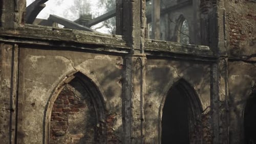 Abandoned Stone Structure with Intricate Arches Surrounded By Overgrown Trees