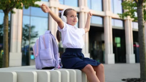 School Girl Listening to Music