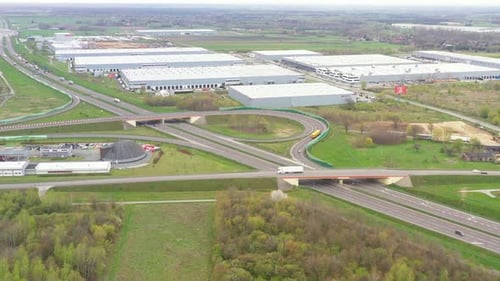 Aerial view of goods warehouse. Logistics center in industrial city zone from above. Aerial view of