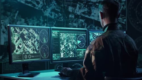 Military Soldier Operating Advanced Technology in a Command Center