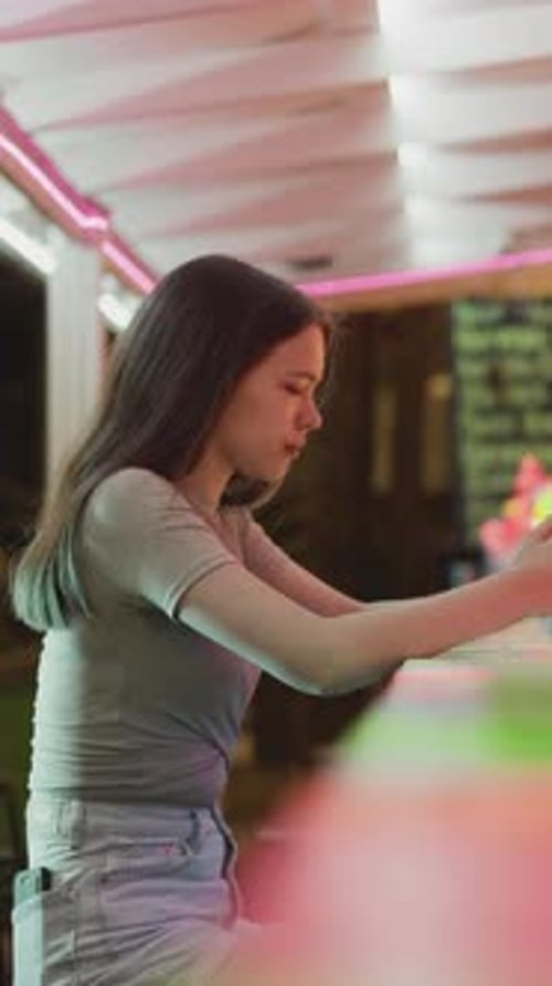 Upset Woman with Beer Sits at Bar Counter