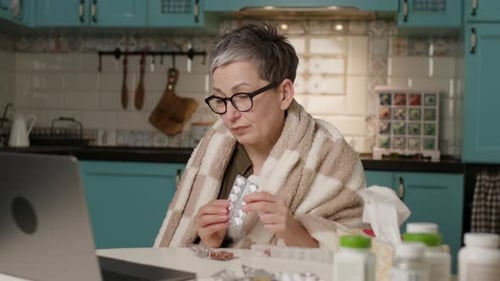 Sick Senior Woman Talking to Doctor Online From Home Close Up