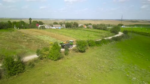 Spray Fertilize On Field With Chemicals In Agriculture Field