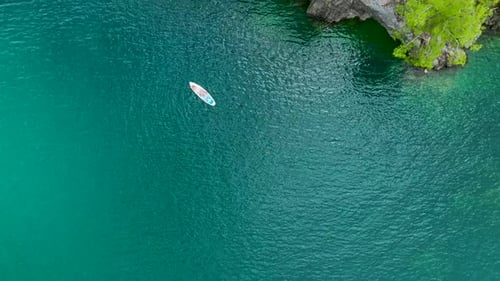 Aerial View Group Paddleboarding Exploration in Turkey s Scenic Canyon