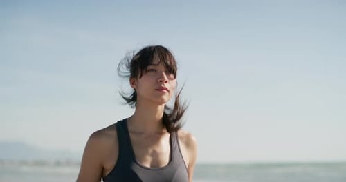 Woman, running and fitness on beach for workout, training and cardio wellness
