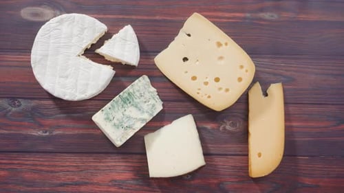 Variety of Cheese on Wooden Table