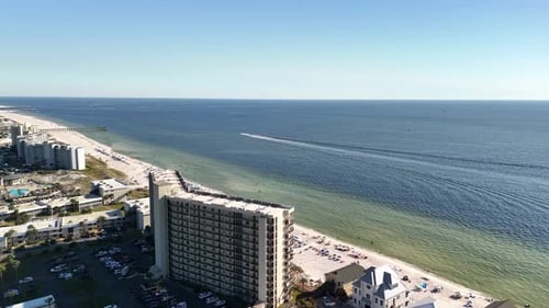 Seafront Luxury Condominium In Panama City Beach During Summer In Florida, USA. Aerial Drone Shot