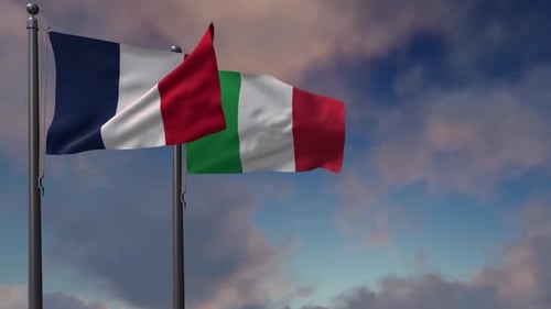 Waving French and Italian Flags Against a Blue Sky