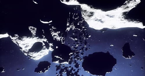 Des débris d'astéroïdes en décomposition se déplacent rapidement avec des ombres changeantes
