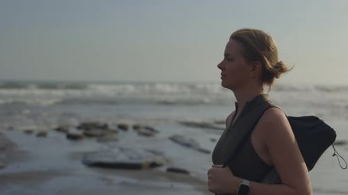 Attractive Young Girl Goes to Yoga Training Among Sea Carries Yoga Mat Side View Cute Woman Going to