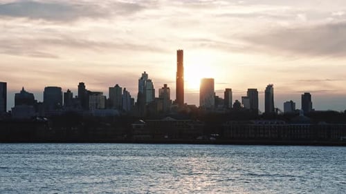 Sunrise Over Manhattan Skyline From Waterfront