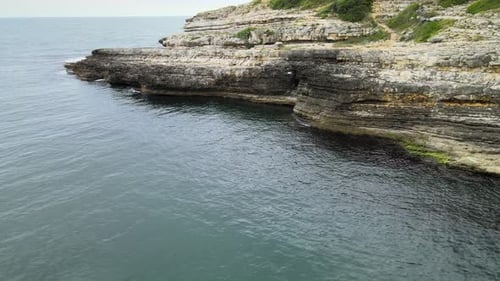 aerial cliff sea waves