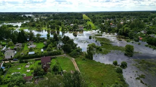 Wide angle panoramic view of countryside rural town rain flooded due to natural calamity. After scen