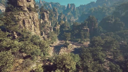 A View of a Mountain Range with Trees and Rocks