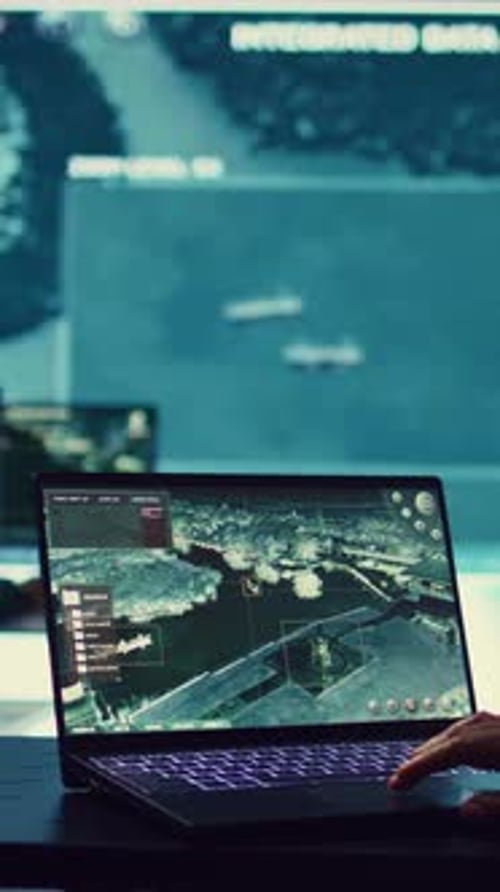 Vertical Video Navy Operations Specialist Examines Ships Along the Coast Line