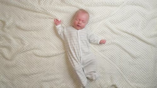 Crying Baby in Bed