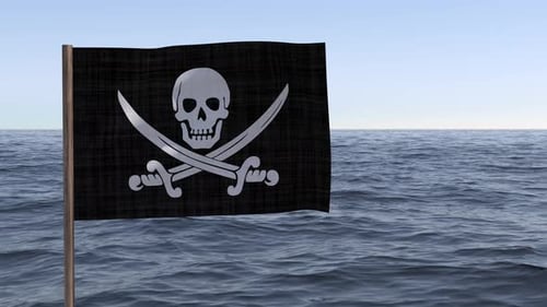 Pirate Flag Waving Near the Ocean on Sunny Day