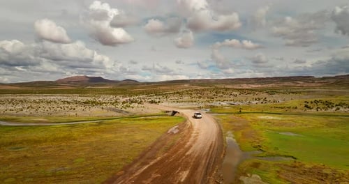 Aerial View Of Pickup Truck Driving Through Siloli Desert In Bolivia