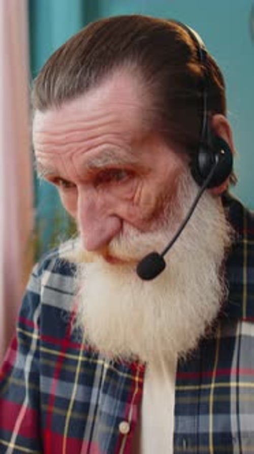 Senior Businessman Wearing Headset Freelance Worker Call Center or Support Service Operator Helpline