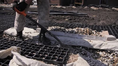 Builder Works with a Shovel