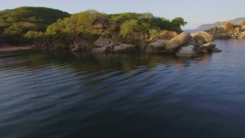 Aerial Drone Quadcopter of Luxury Water Front Hotel Resort on Island, Rustic