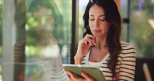Woman With Tablet Indoors By Window
