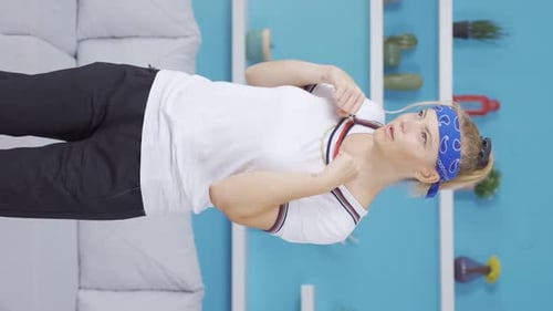 Woman Practices Boxing Punches with Headband