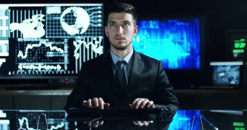 a young man controls the financial purse and the economy graphs to check the financial workflows a