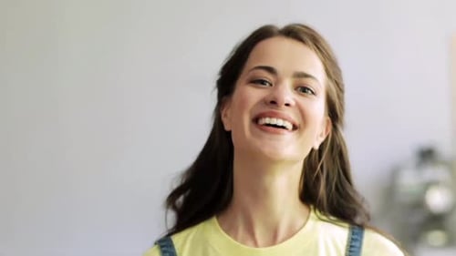Smiling Young Woman Posing in a Bright Interior