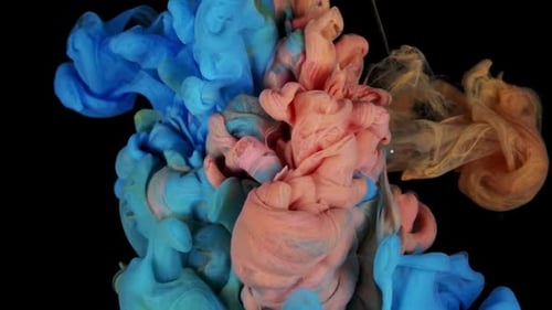 Colorful Ink Mixing in Water on Black Background