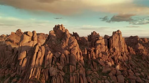 Aerial Flyover of Red Rock Formation in Canyon Desert Gobi