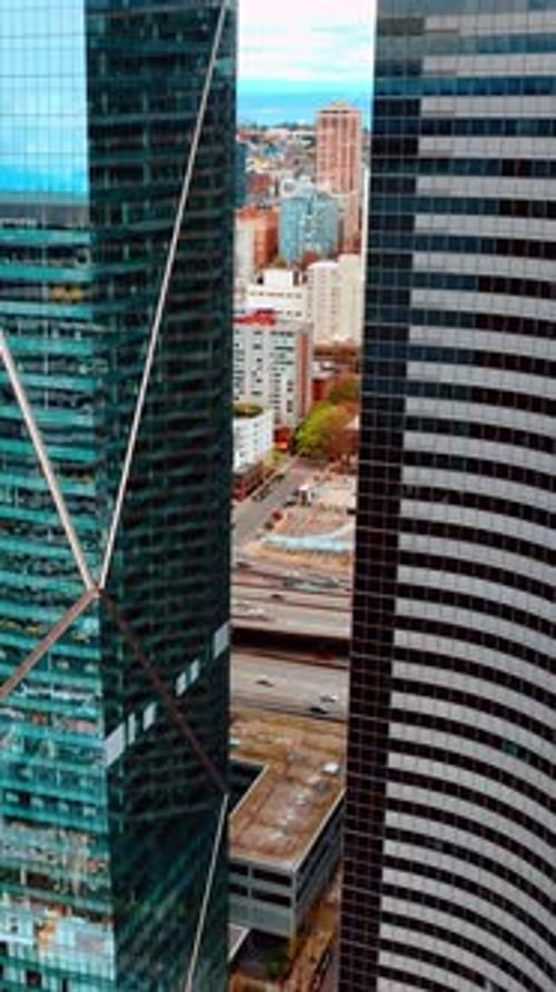 Business center aerial view city. American modern Seattle district. Vertical video