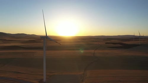 Aerial View Of Wind Power Plant At Sunset