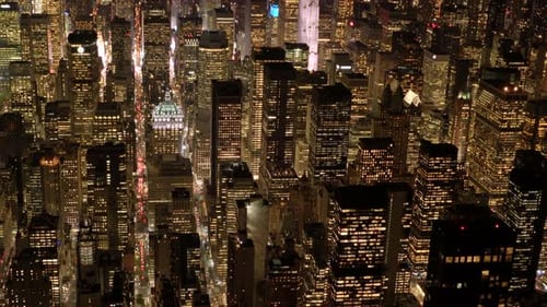 Breathtaking Aerial View Showcasing a Colorful and Vibrant Cityscape at Nighttime