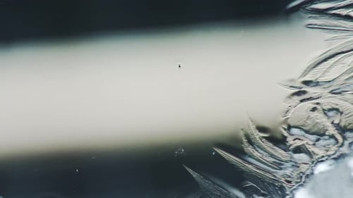 Elegant Crystal Textures Forming on Gray Backdrop
