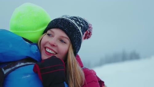 Cute Happy Loving Couple in Outerwear with Backpack Hug Stand in Mountains in Forest Sport Healthy
