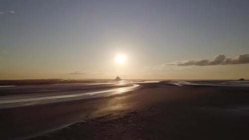 Mont Saint Michel abbey medieval castle in Normandy Bretagne France. Gothic island fortification sun