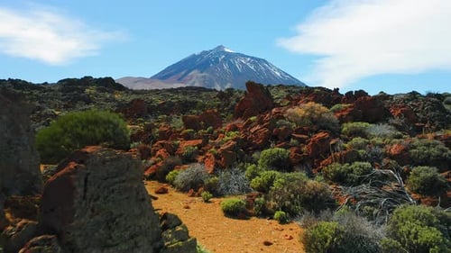 Teide National Park Volcano Covered with Snow in Winter with Deserted Lava Landscape on Tenerife
