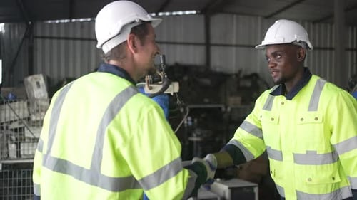 Engineer work at robotic arm factory.