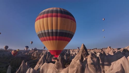 Sightseeing Balloons Floating In The Valley