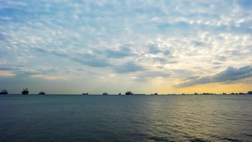 sea sunset, ships on the horizon