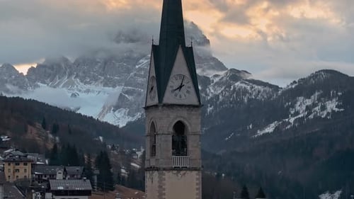 Aerial drone view of the San Lorenzo Church in the Selva di Cadore comune, in the Dolomites, Italy
