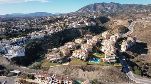 A housing estate located on a beautiful mountain.