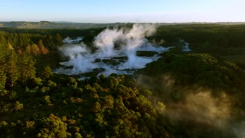 Aerial View of Steaming Geothermal Area in Forest
