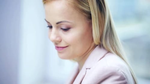 Business, People, Communication and Technology Concept - Face Smiling Woman Calling On